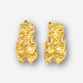 Pair of large gold crinkle earrings on a light gray background