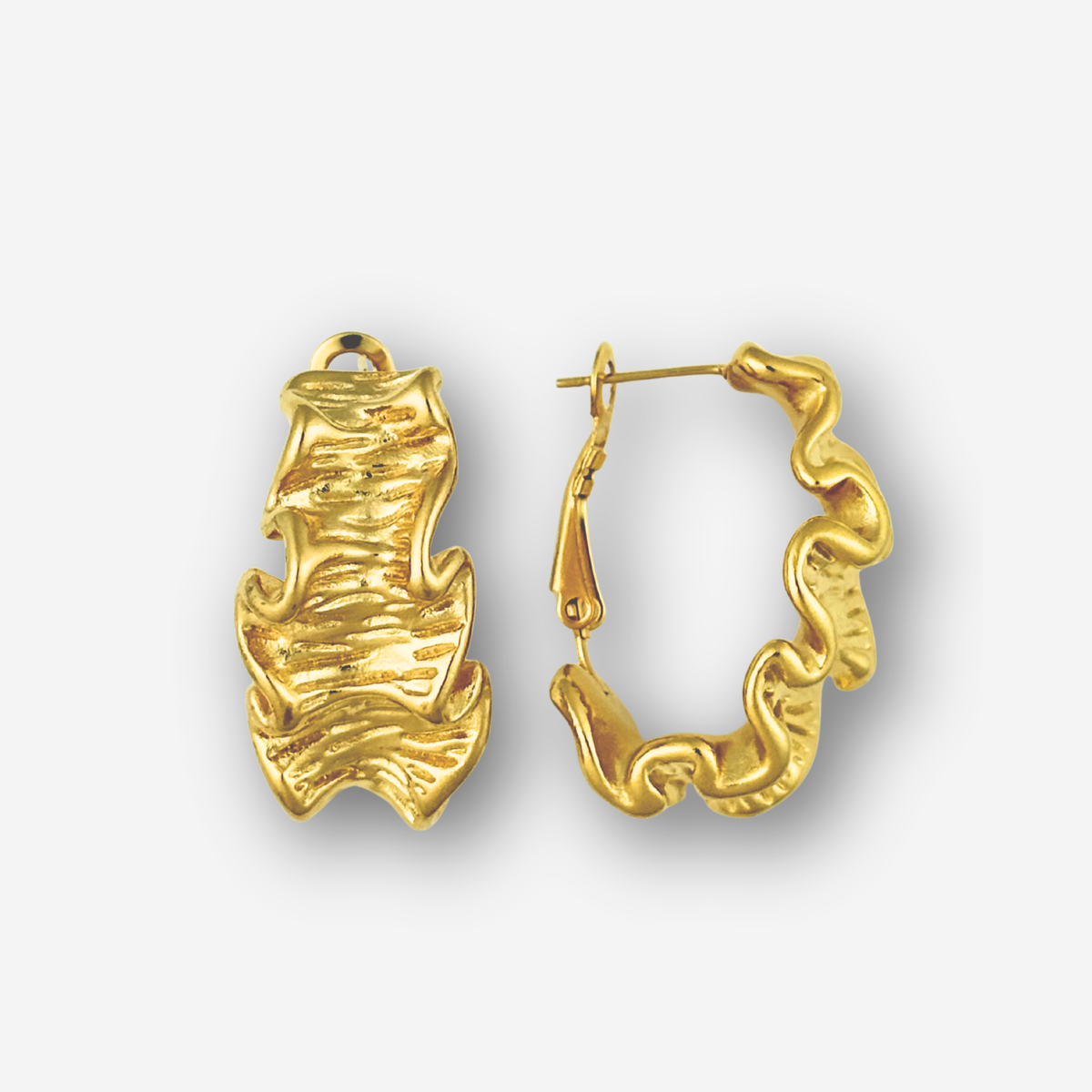 Pair of gold hoop earrings on a light gray background