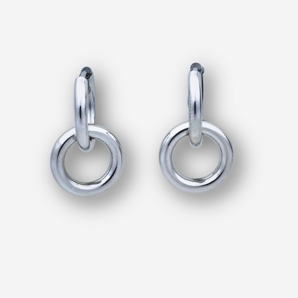 A pair of polished silver hoop earrings with a circular drop ring, shown on a light gray background.
