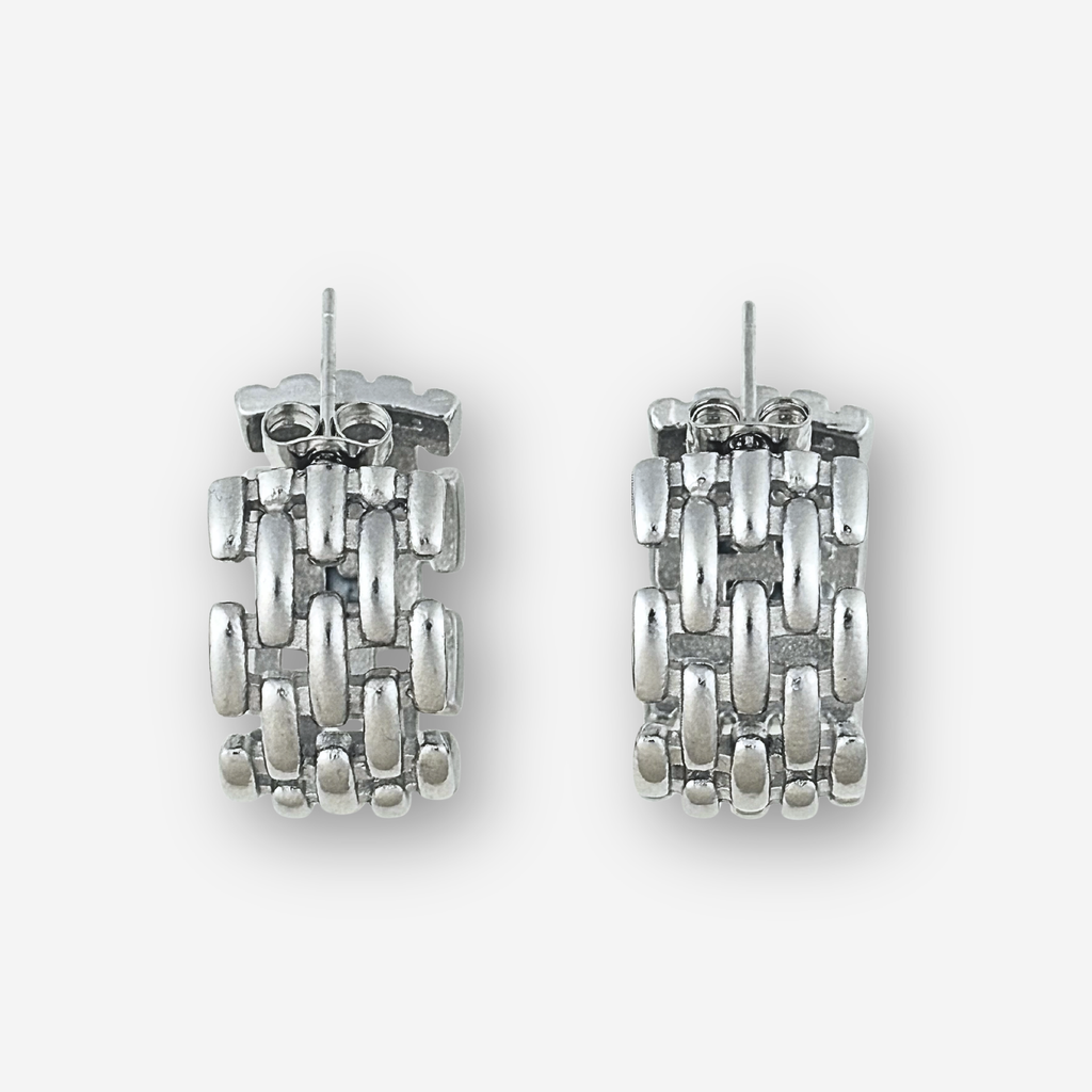 Pair of silver hoop earrings on a white background