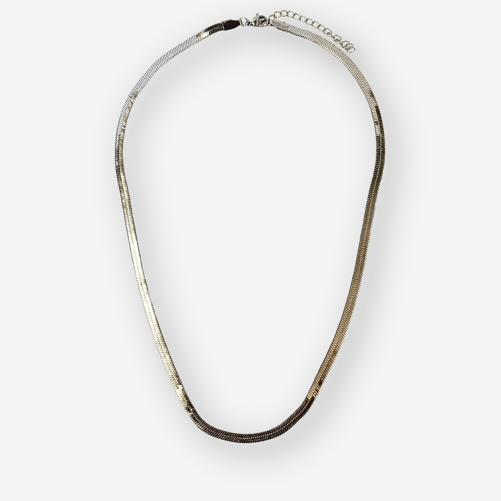 A silver-toned herringbone chain necklace, displayed on a light gray background.