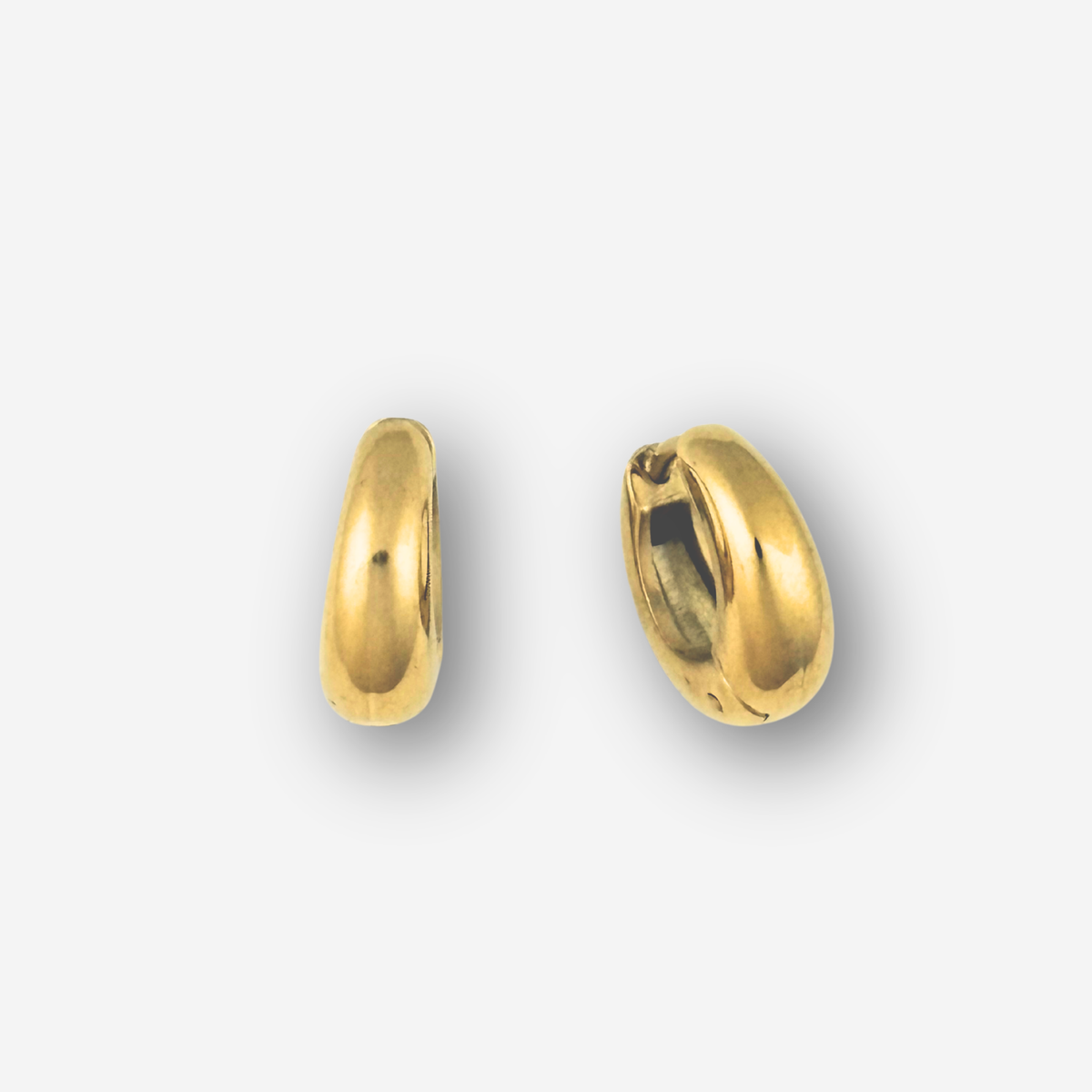 Pair of gold hoop earrings on a white background