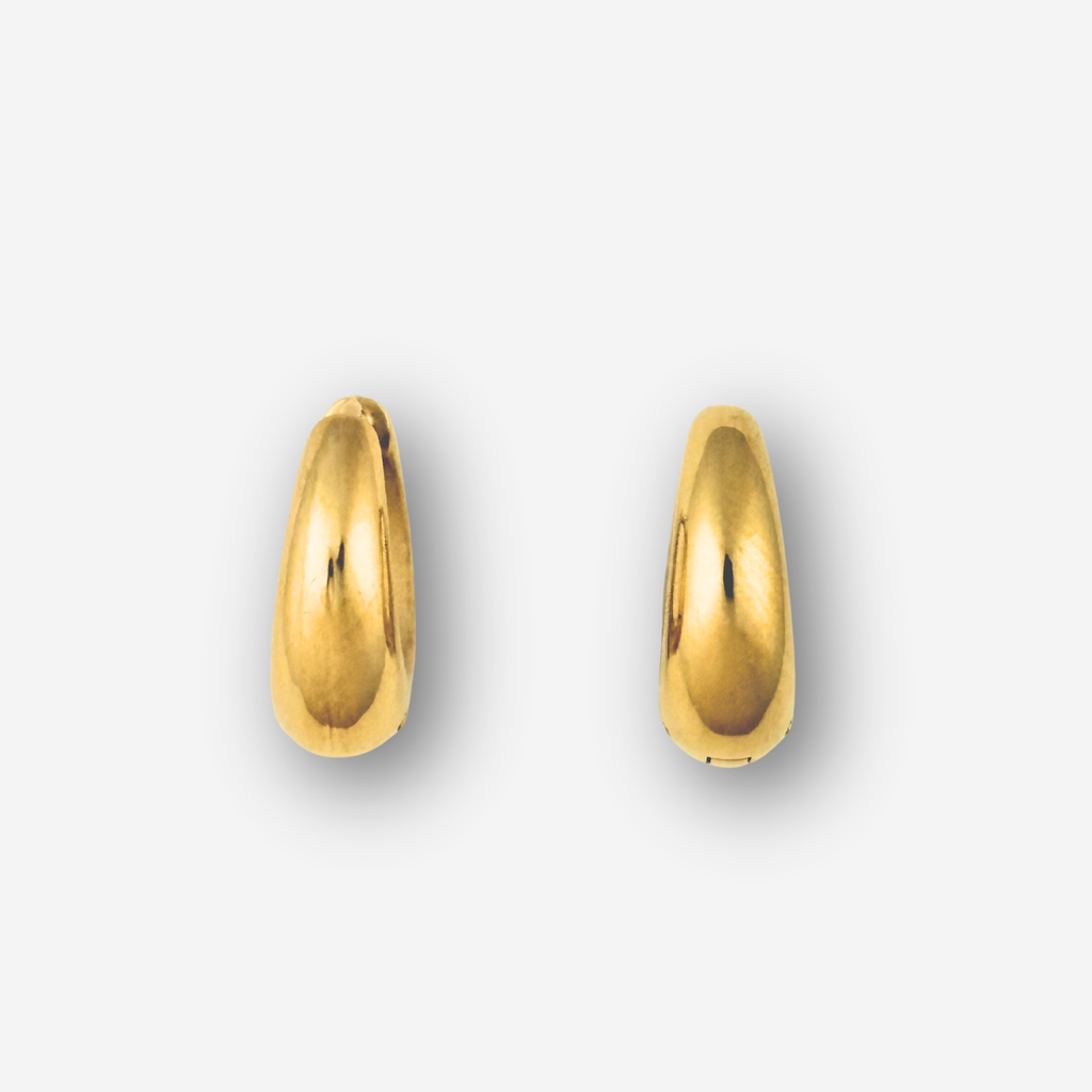 Pair of medium size gold hoop earrings on a white background