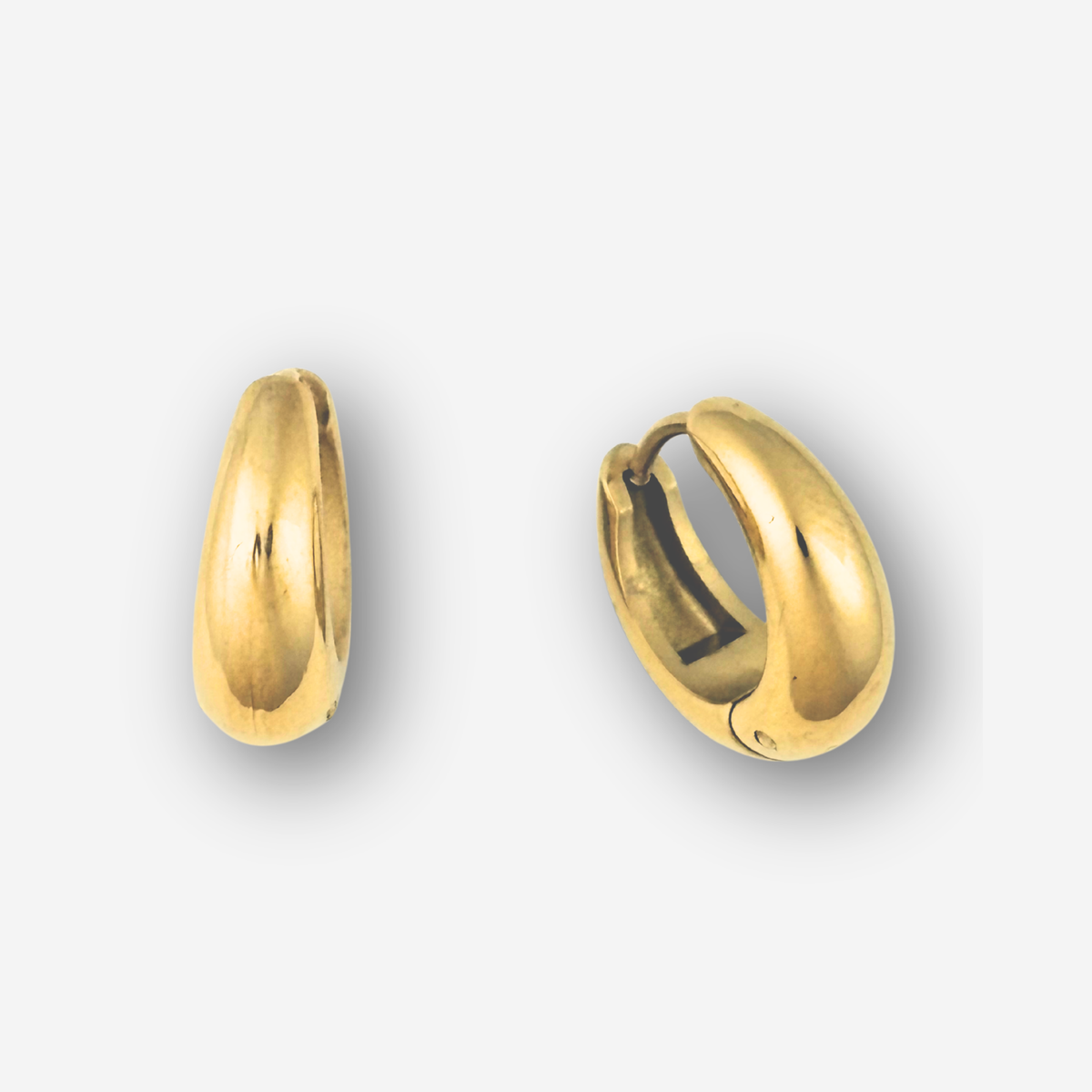 Pair of gold hoop earrings on a light gray background