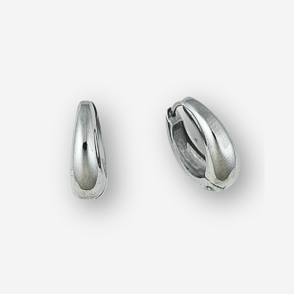 Medium size silver hoop earrings on  light grey background