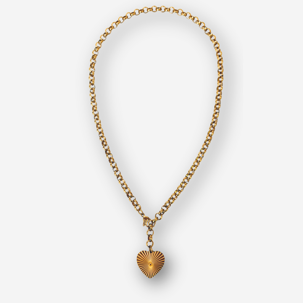 A gold chain necklace with a sunburst heart pendant, displayed against a clean white background.
