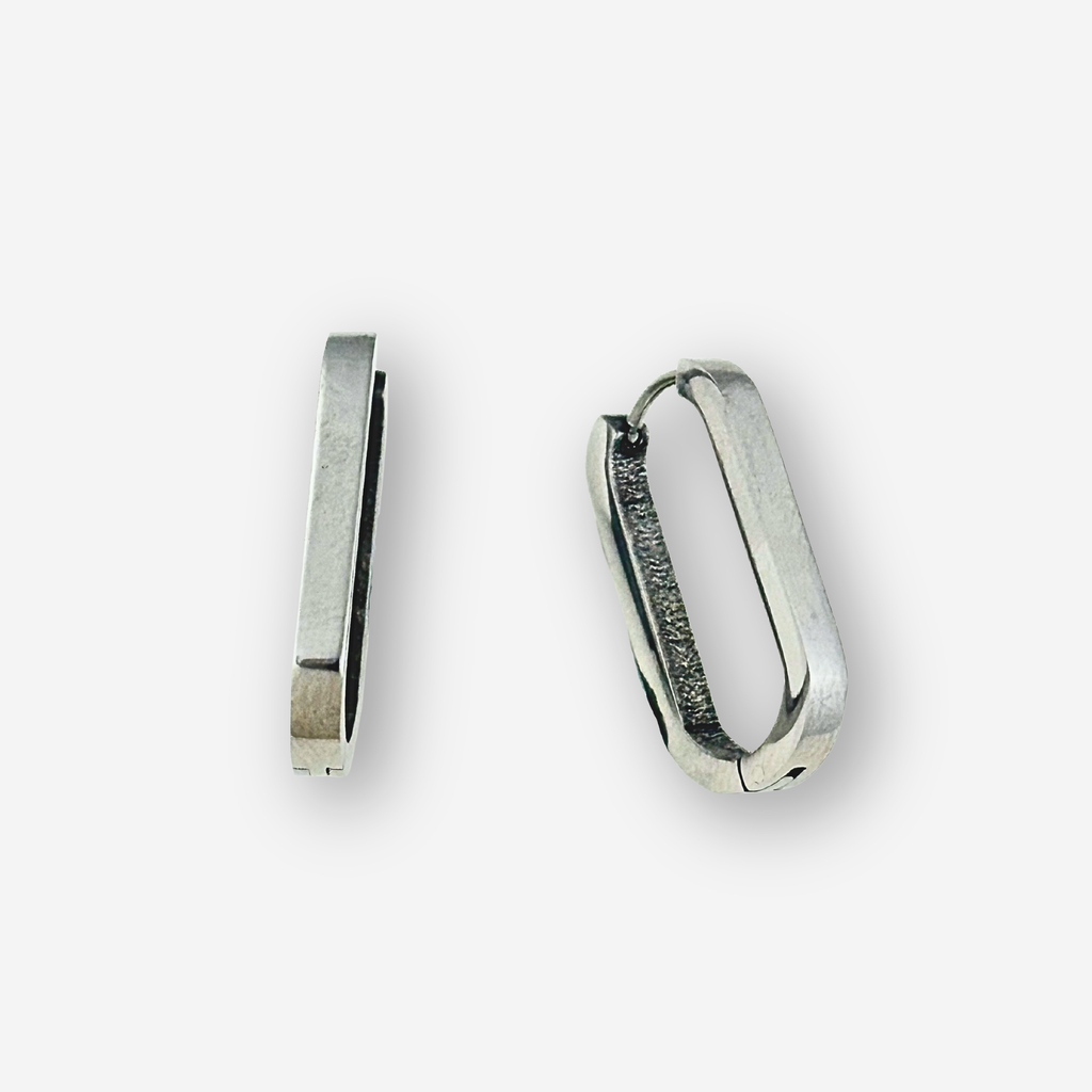 Pair of silver hoop earrings on a white background