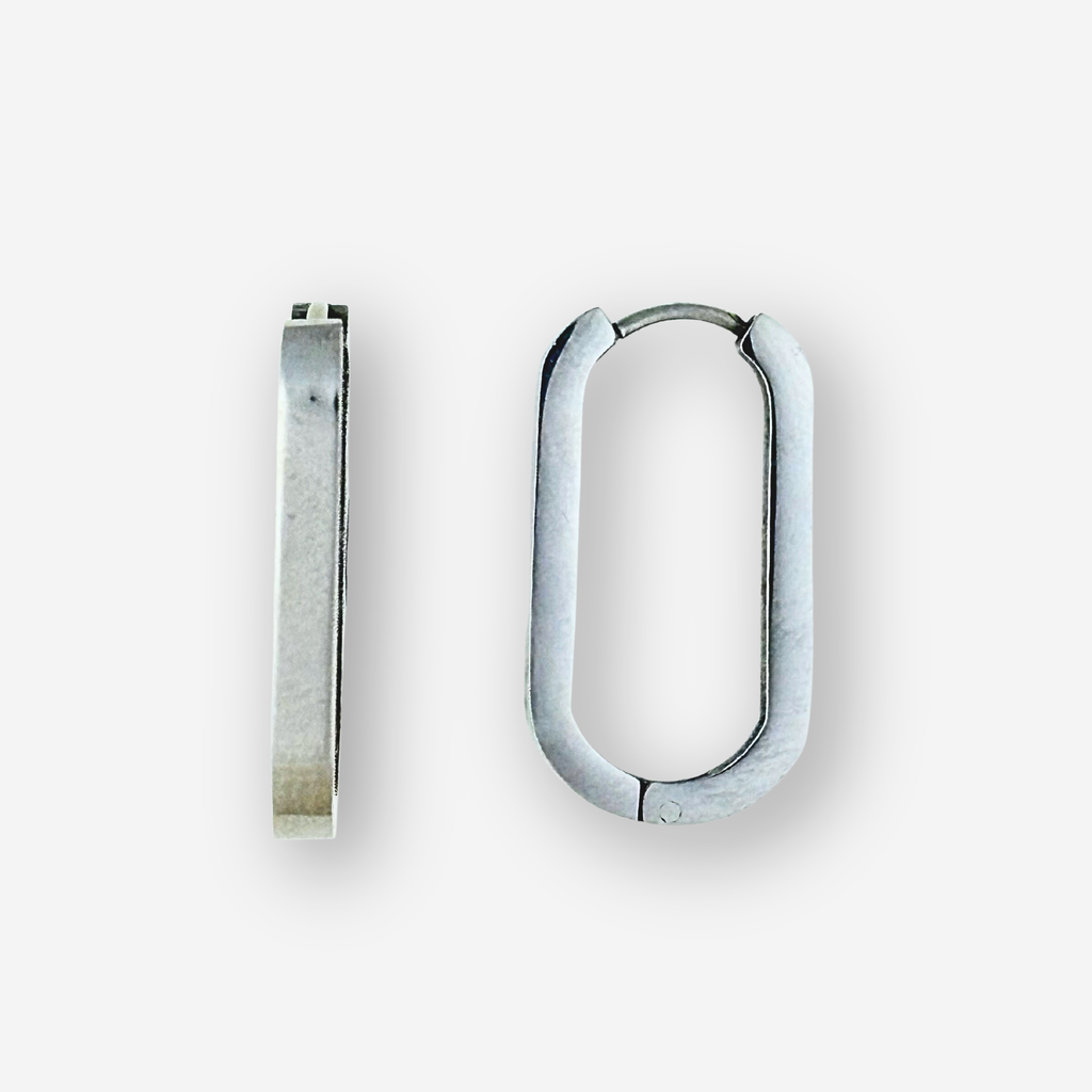 Silver hoop earrings on a light gray background