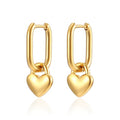 Gold heart-shaped hoop earrings on a white background