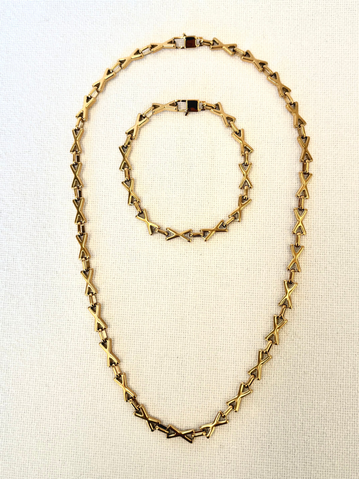 XOXO Gold Bracelet and necklace