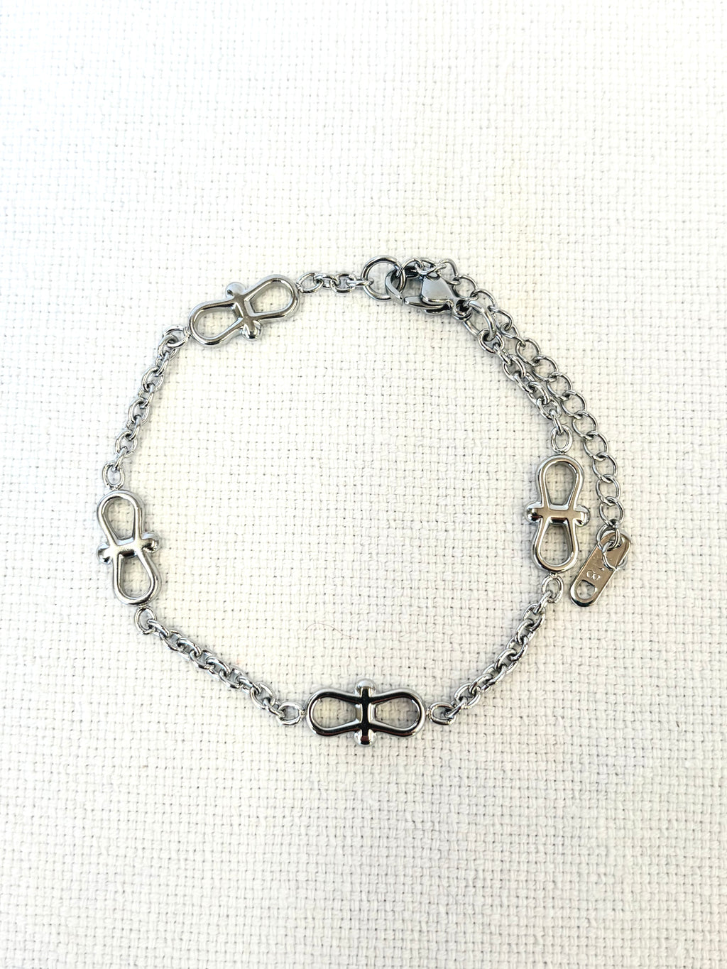 Infinity Chain Silver Bracelet on a neutral background