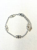 Infinity Chain Silver Bracelet on a neutral background