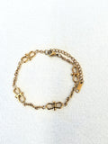 Infinity Chain Gold Bracelet on a neutral background