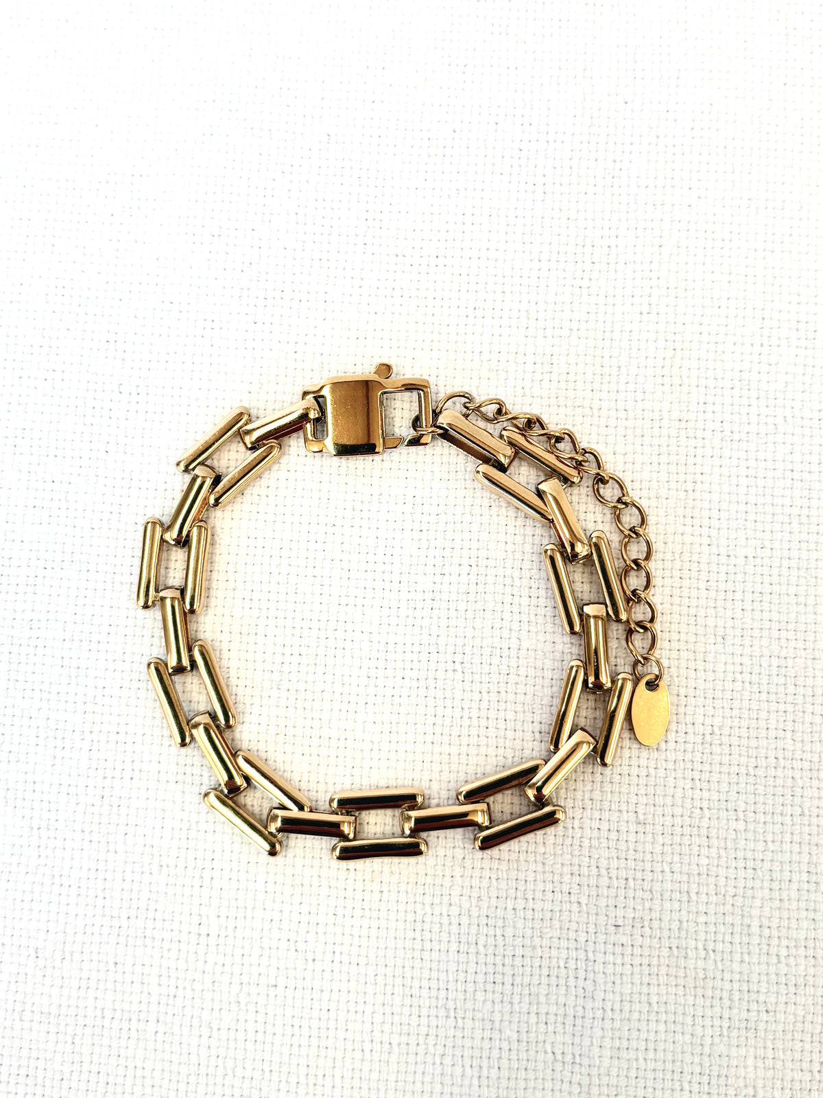 Sloane Gold Bracelet on a neutral background