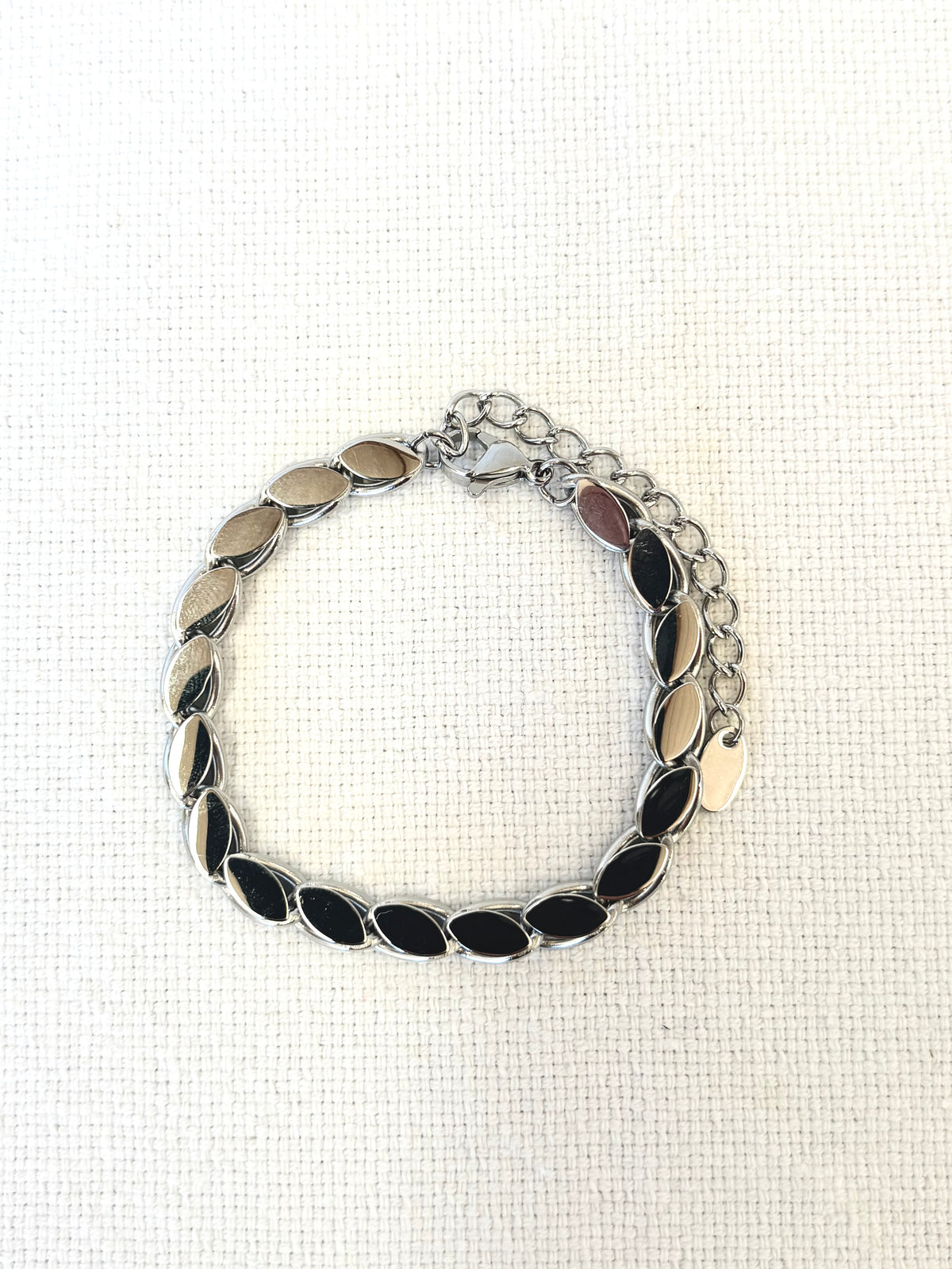 Lumi Silver Bracelet on a neutral background