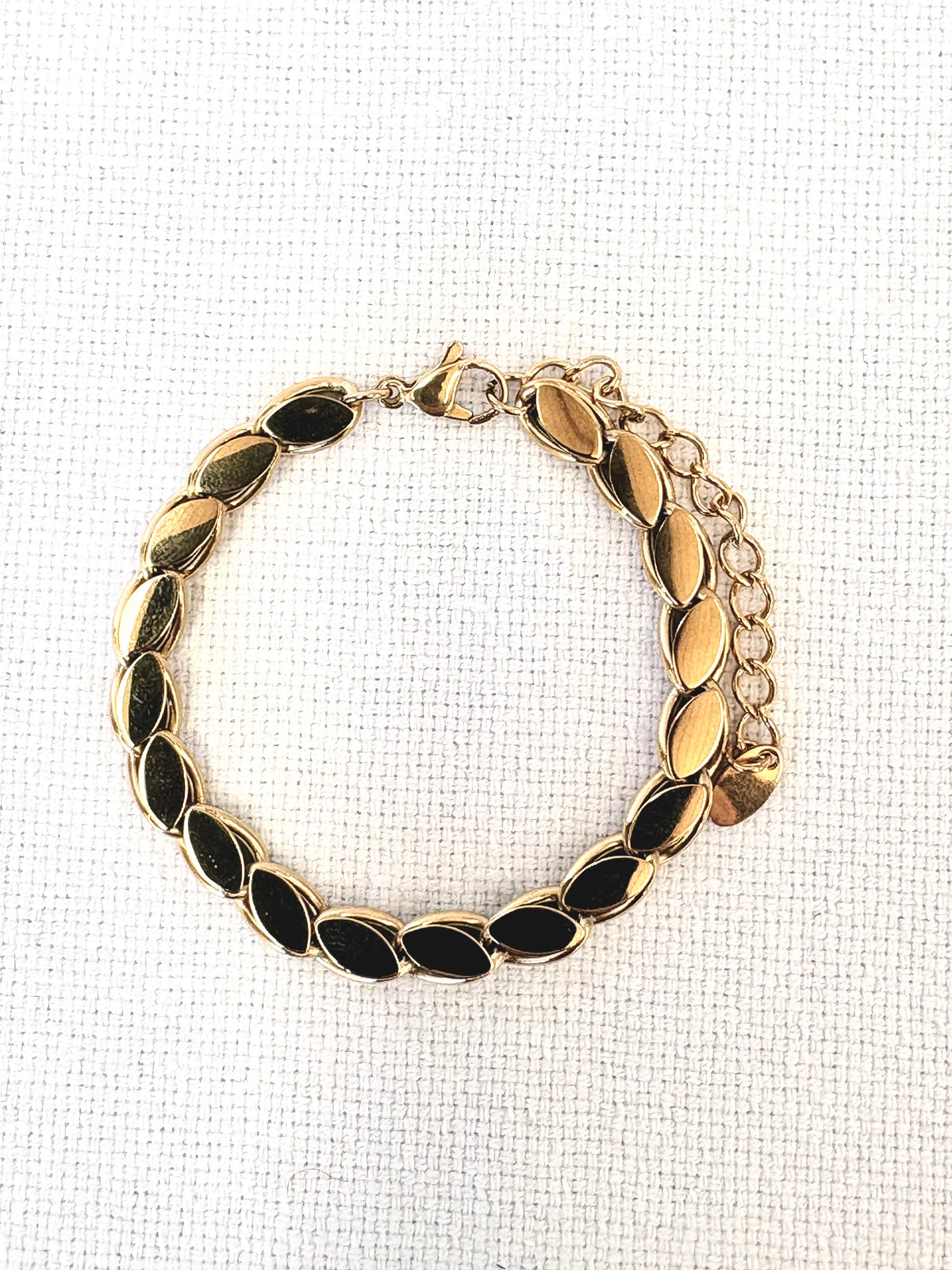 Lumi Gold Bracelet on a neutral background