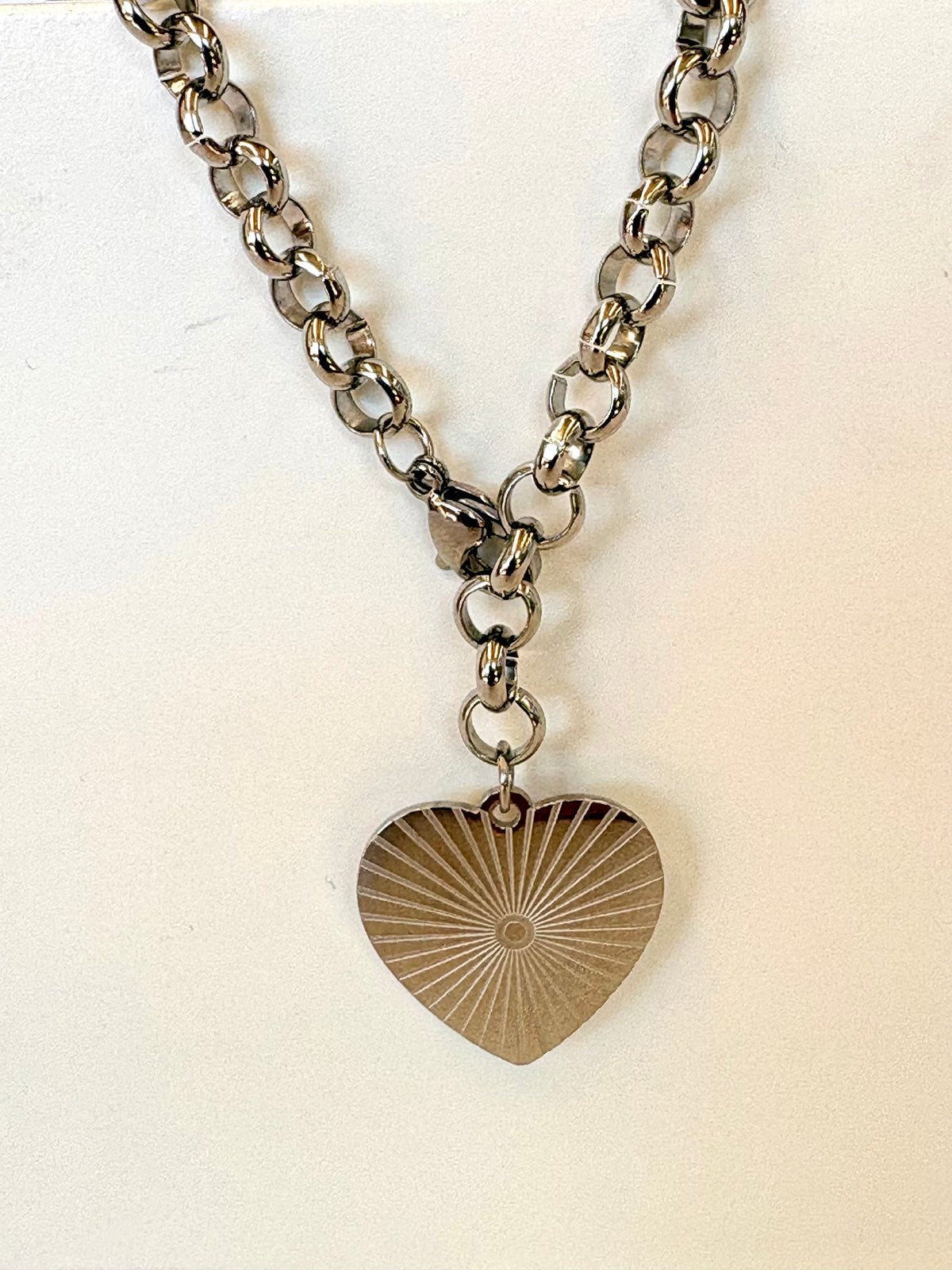 Necklace with a heart-shaped pendant on a white background