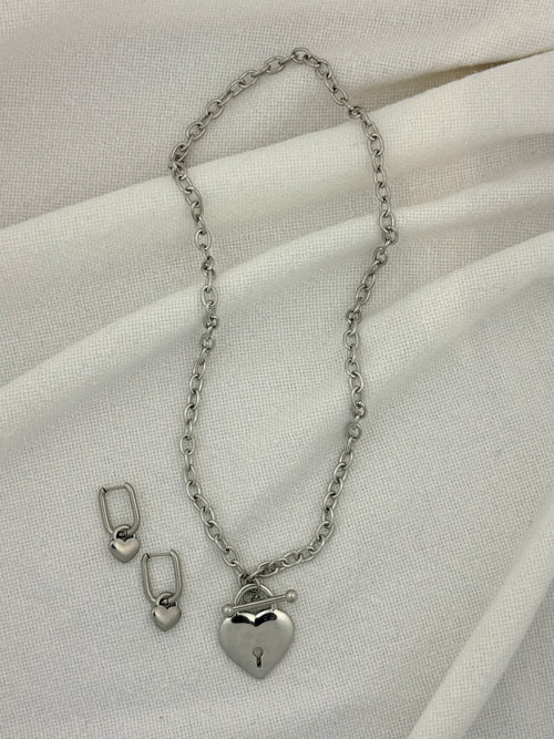 Silver necklace with heart pendant and heart hoop earrings